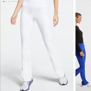 White Jaanuu Yoga Scrub Pants size S. Never worn still in packaging